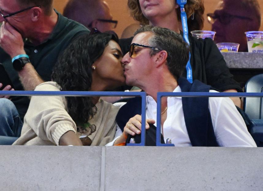 Simone Ashley kissing Alexander Bublik.