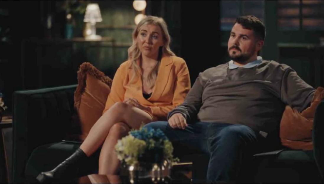 Sarah from MAFS UK in an orange blazer next to Dean in a grey sweater.
