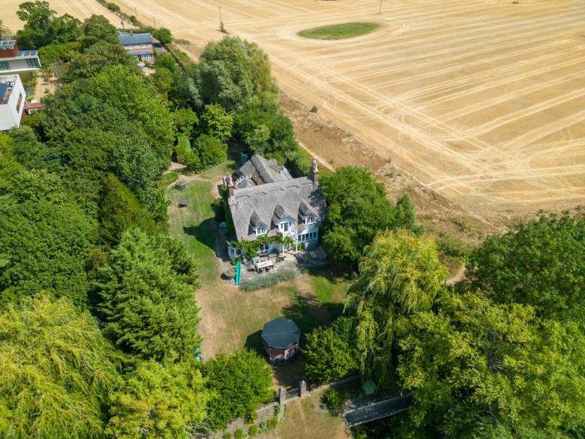 Russell Brand's £6M Mansion Boasts Lush Green Lawn Despite Hosepipe Ban and Sweltering Heatwave