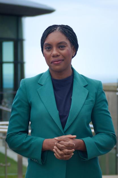 Kemi Badenoch, Leader of the Conservatives in Westminster, smiling.