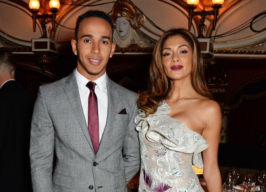 Lewis Hamilton and Nicole Scherzinger pose together at the British Fashion Awards.