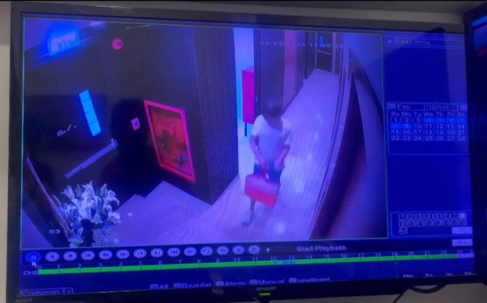 Security footage showing Quentin Griffiths returning to his apartment.