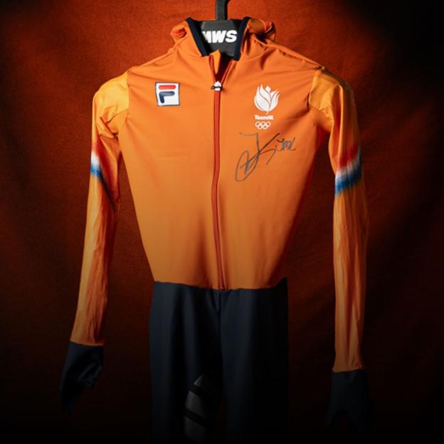 Orange Fila TeamNL Olympic speed skating suit with a signature.