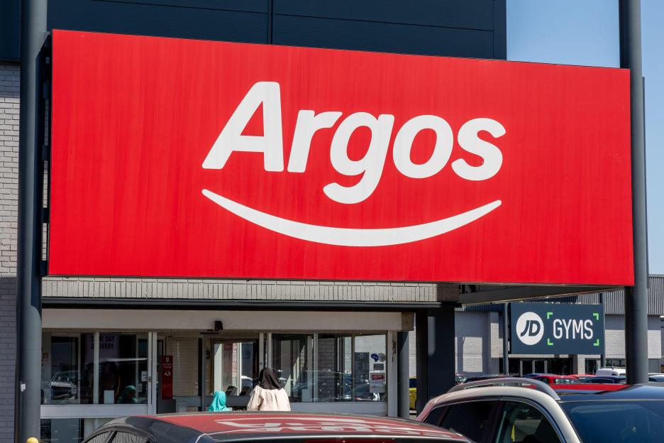 The red and white Argos sign at the entrance of an Argos store.