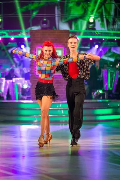 Diane Buswell and Joe Sugg dancing together.