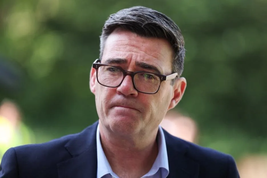 Prime Minister Andy Burnham during a visit to a bus station in Bath.