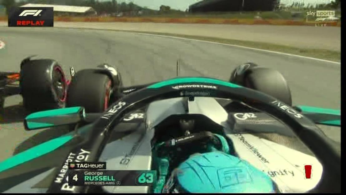 Replay of George Russell's car colliding with another during the Spanish Grand Prix.