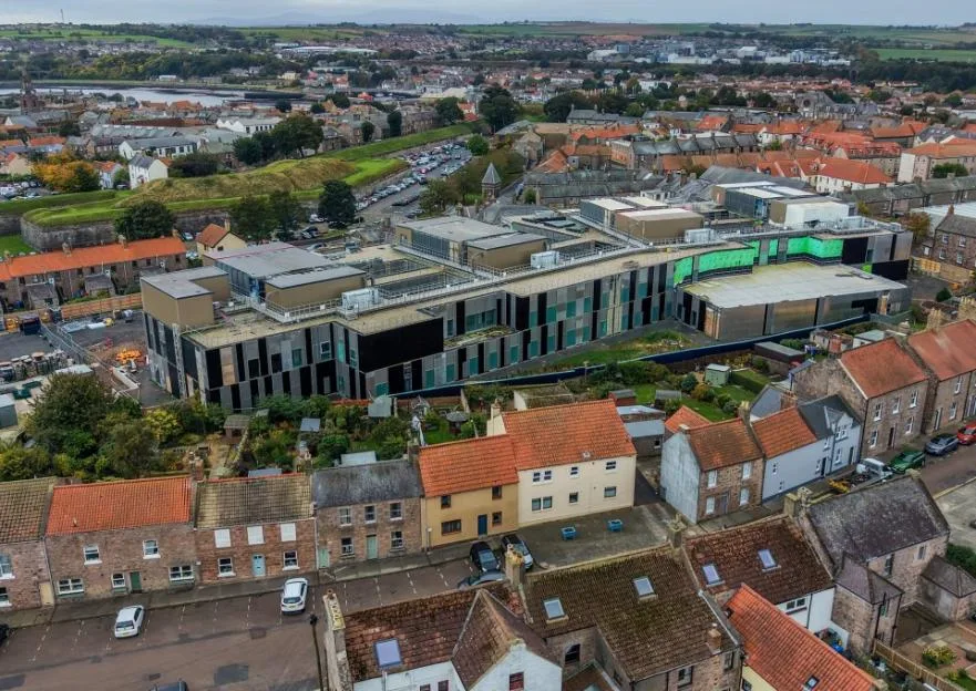 'Our homes are dwarfed by monstrous hospital that looks like a giant cigarette bin'