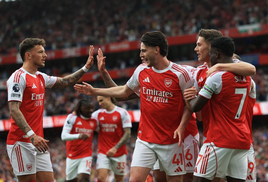 Arsenal's Viktor Gyokeres celebrating their first goal with teammates.