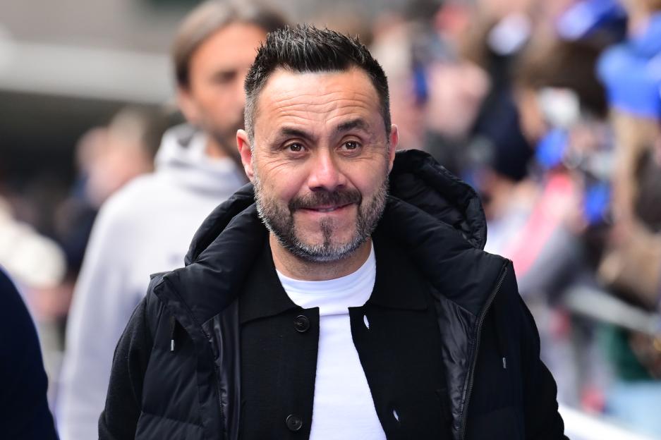 Tottenham Hotspur manager Roberto De Zerbi smiling.