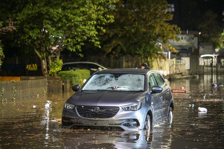 Church Road, Birmingham, 26th August 2026. Two cars have been flooded on Church Road in Birmingham, Several others were also swamped in their driveways with residents bainling water out. Severe rainfall fell within an hour as lightning also lashed th