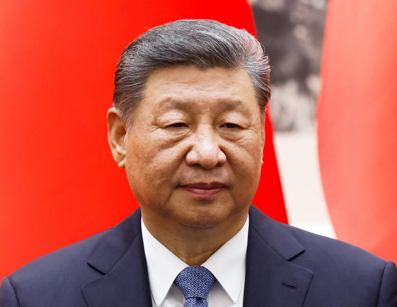 Chinese President Xi Jinping looks on during a signing ceremony.