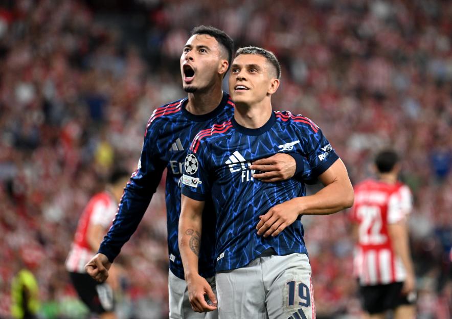 Leandro Trossard celebrates his goal with Gabriel Martinelli of Arsenal.