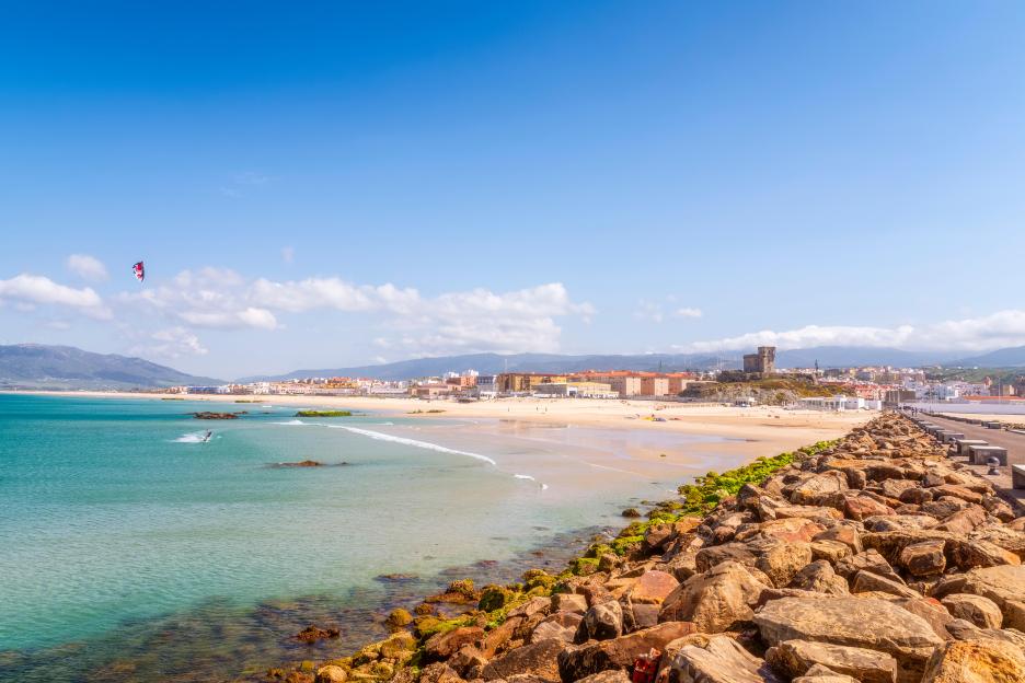 Kite surfer on the ocean near Tarifa beach.