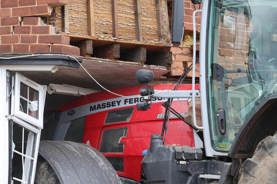 Masked Bandit, 28, Steals Tractor and Crashes into Family Home, Creating a Massive Hole in the Front Window