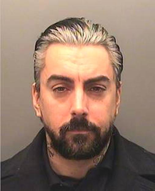 Mugshot of Ian Watkins.
