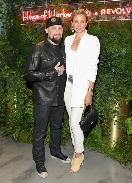 Guitarist Benji Madden and actress Cameron Diaz at the House of Harlow 1960 x REVOLVE event.
