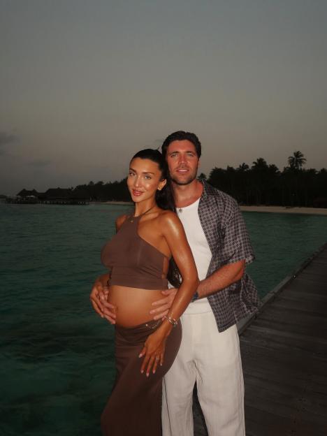 Tom Pearce and his partner announcing their baby.