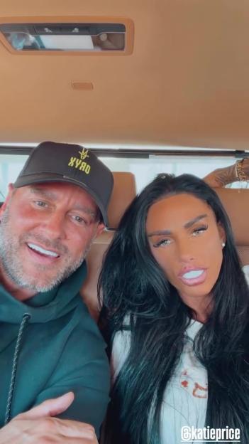 Carl Woods and Katie Price posing for a selfie in a car.