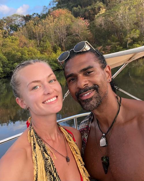 David Haye and Sian Osborne smiling on a boat.
