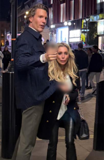 Philip Ostermann and Melissa Rein Lively are seen in a public place.