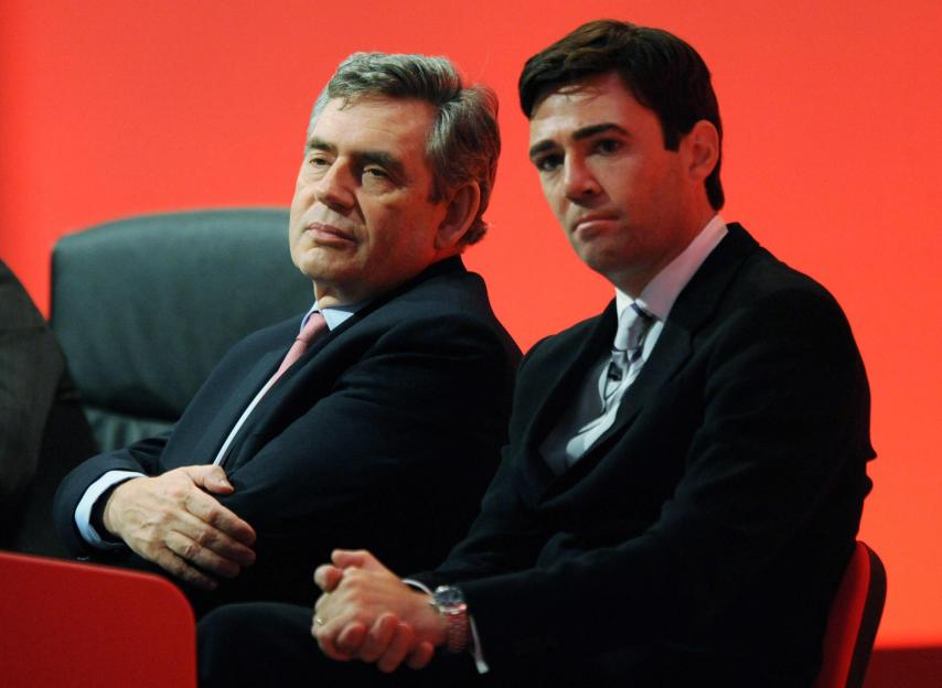 Prime Minister Gordon Brown and Health Secretary Andy Burnham sitting on stage at the Labour Party conference.