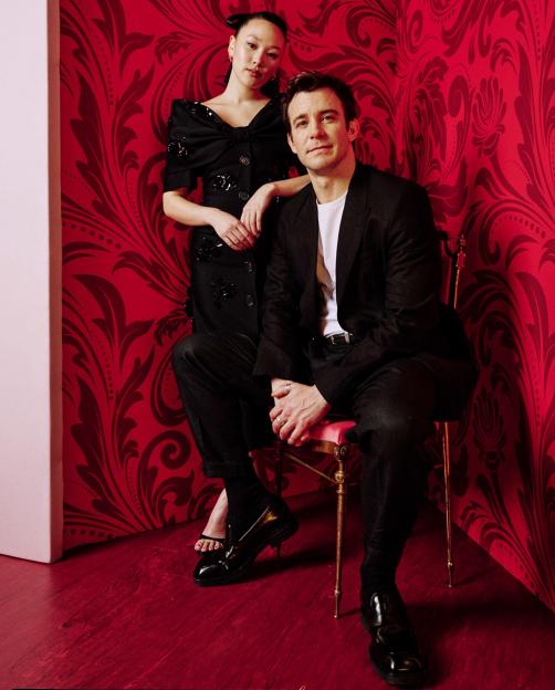 Luke Thompson and Yerin Ha posing for Bridgerton.