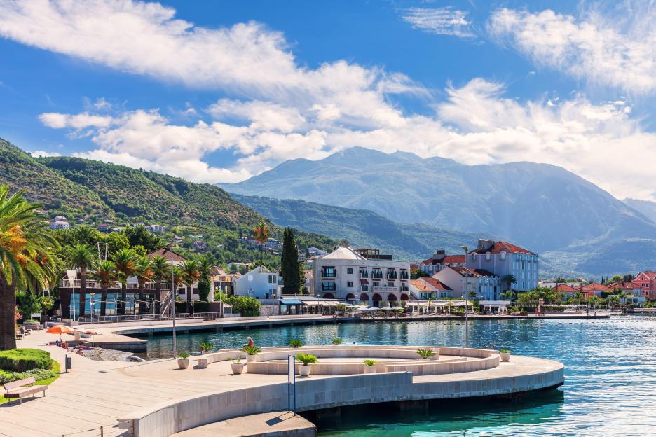 Porto Montenegro marina in Tivat with mountains in the background.