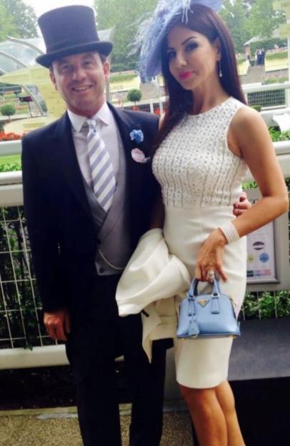 Gerry Sherard and a woman pose in formal attire.