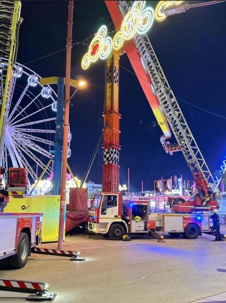 VIDEO: Thrill seekers spend FOUR HOURS dangling 100ft in air after ride malfunctions