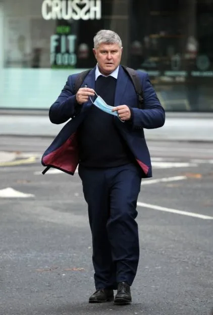Thain Kleinhentz outside High Court before hearing in row over £1.2m property sale with Mark Harrison