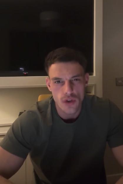 Jeremy McConnell looking directly at the camera with a serious expression.