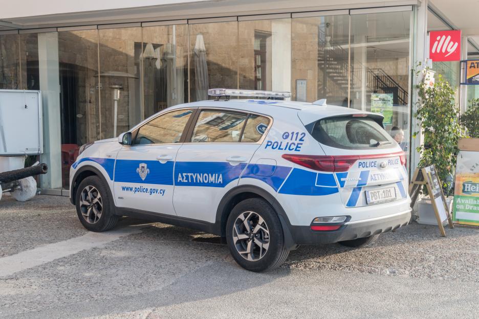 Kia sportage of Cyprus police. White and blue Cyprus police car (also called a police cruiser, police interceptor, patrol car, cop car).