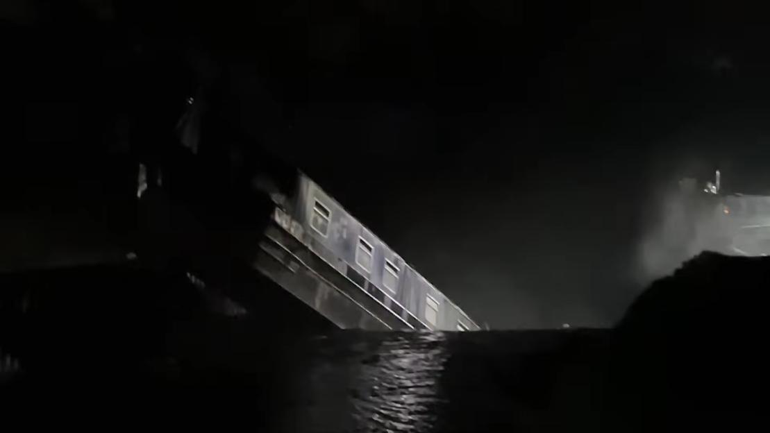 'Watch as 164ft Sinkhole Devours Canal Boat in Dramatic Rescue of 10 People'