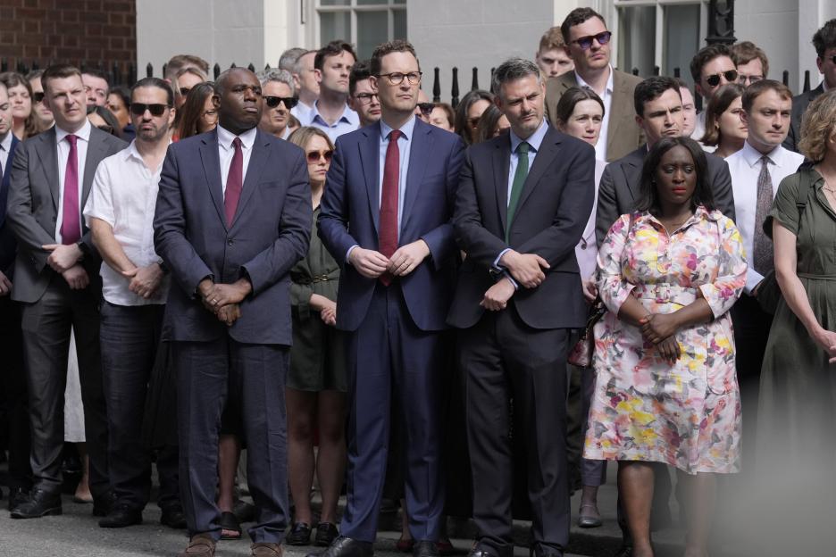 Deputy Prime Minister David Lammy and Chief Secretary to the Prime Minister Darren Jones stand in the front row of a crowd.