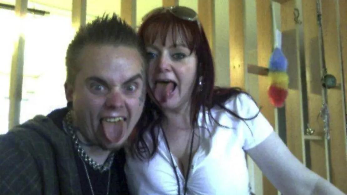 Isakin Jonsson and Helle Christensen with their tongues sticking out.