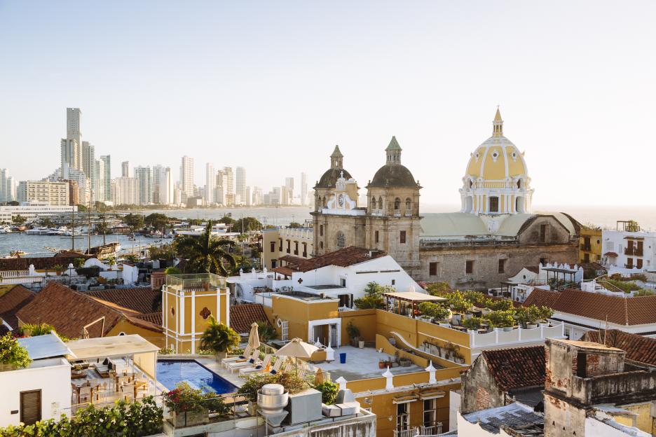 Skyline of Cartagena with the Church of San Pedro Claver and Monastery and the modern building of Bocagrande in the background. Cartagena de Indias, Colombia.