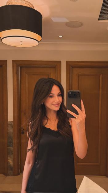 Michelle Keegan taking a mirror selfie.