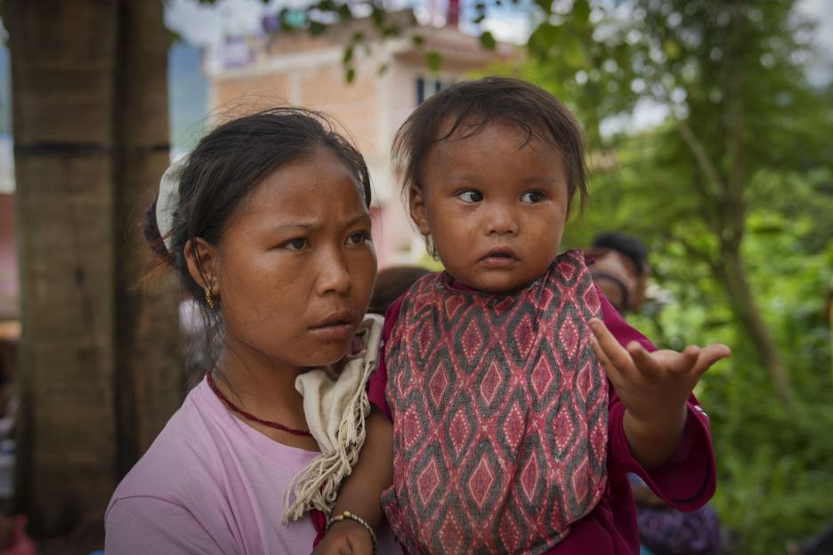 Mother Urmila Tamang and her son Tamang, flood survivors from Nepal, at temporary accommodation in Bidur, Nuwakot.