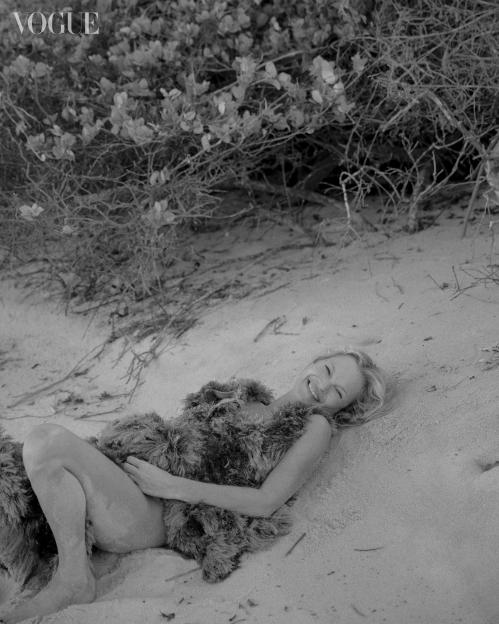 Kate Moss Strips Down in Faux Fur for a Stunning Cavewoman-Inspired Shoot