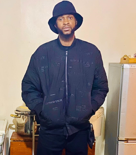 Trevelle Rowland wearing a bucket hat and a black jacket.