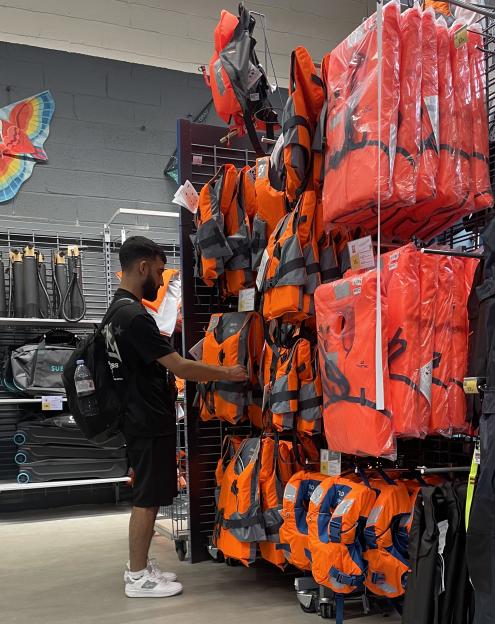 French Sportswear Giant Cashes In on Life Jackets for Migrants Crossing the Channel