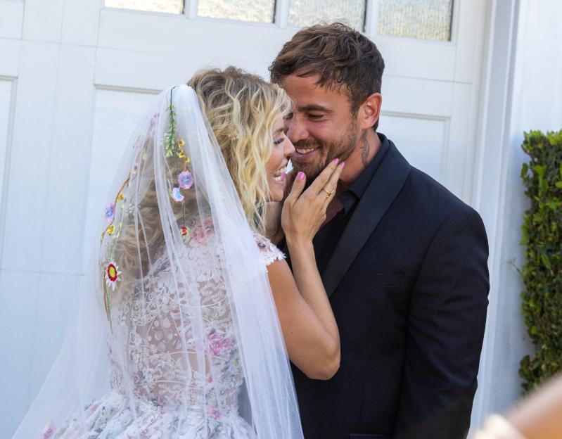 Annalynne McCord and Danny Cipriani smiling at their wedding.