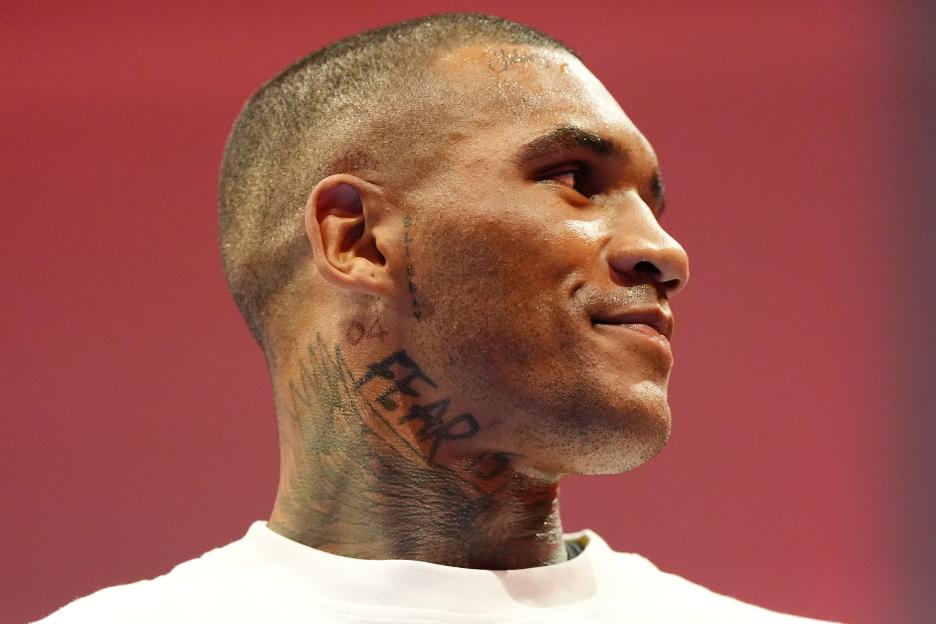 Conor Benn holding his WBA Continental Welterweight title belt.