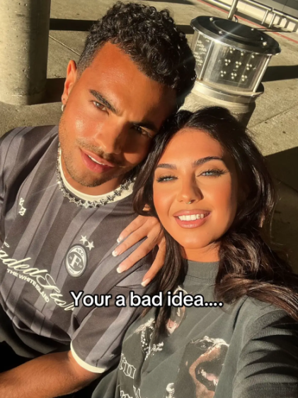 Belle Hassan and Harrison Solomon posing together with the text "Your a bad idea...." overlayed.