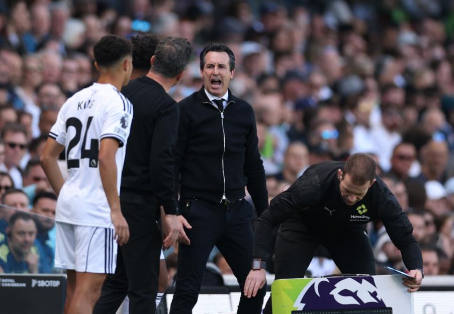 Aston Villa manager Unai Emery shouts from the sidelines during a Premier League match.