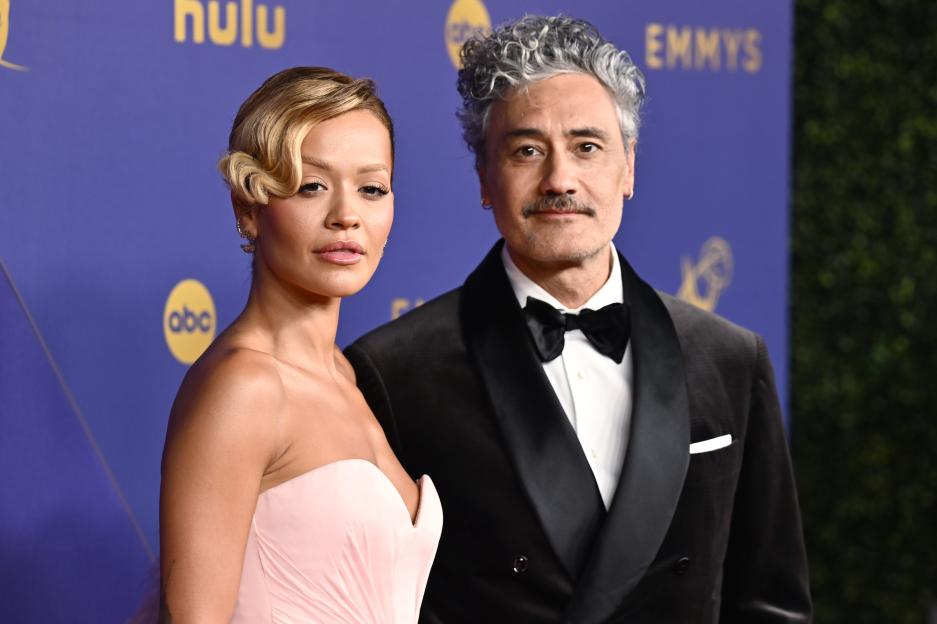 Rita Ora in a light pink strapless gown and Taika Waititi in a black tuxedo at the 76th Primetime Emmy Awards.