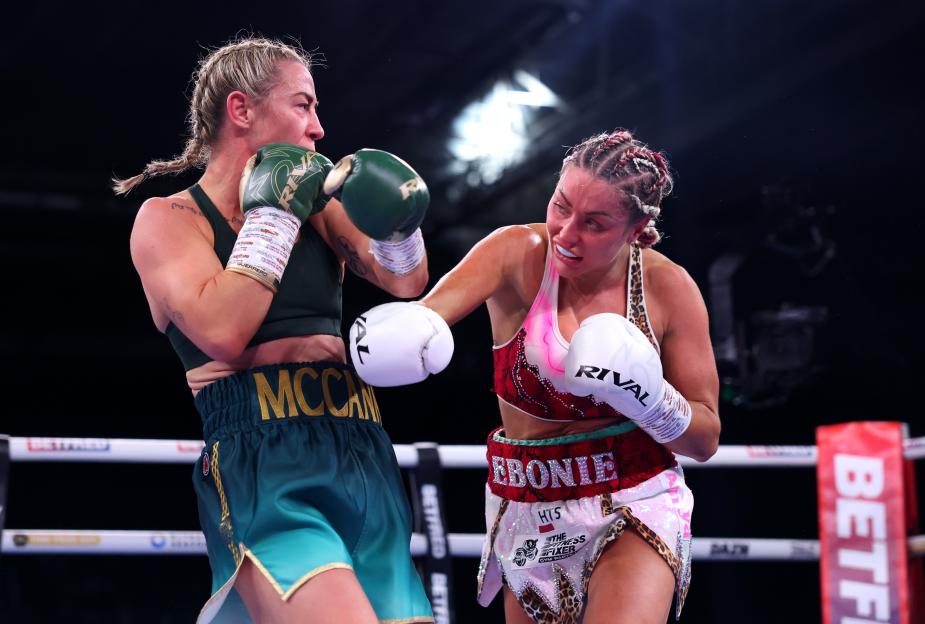 Ebonie Cotton punching Molly McCann during their super bantamweight fight.