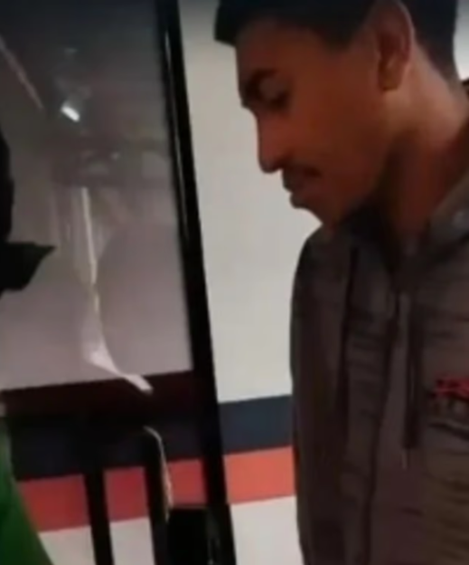 Man looking at a screen.