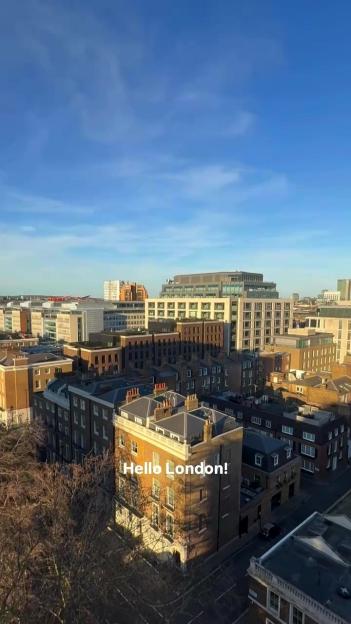 Aerial view of London cityscape with the text "Hello London!" overlaid.